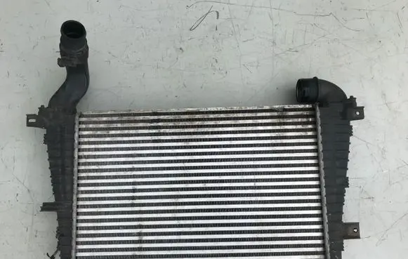 Opel Zafira B Intercooler radiator 13223395