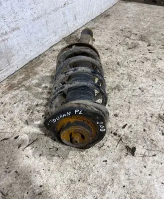 Front shock absorber with coil spring