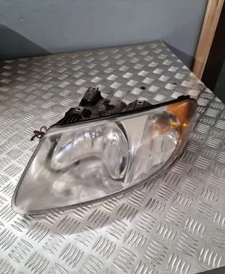 Chrysler Voyager Headlight/headlamp 04857701AB