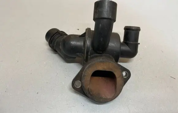 Thermostat/thermostat housing