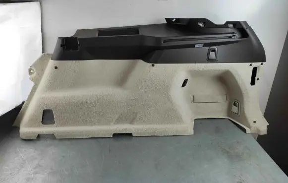 Trunk/boot lower side trim panel
