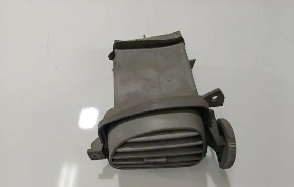 Nissan Almera Tino Dash center air vent grill 68760BU200