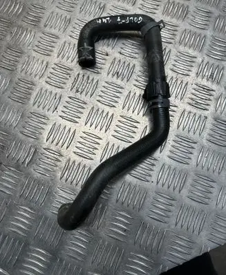 Volkswagen Golf VII Engine coolant pipe/hose 5Q0121063M