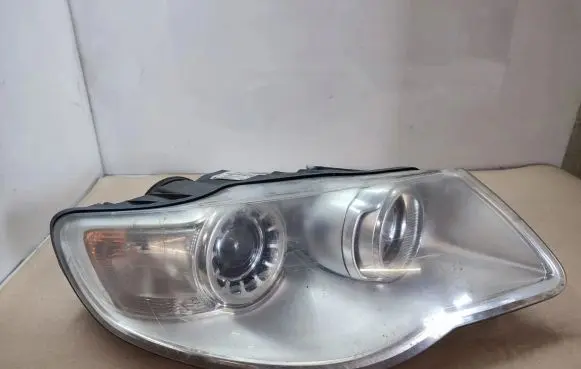 Volkswagen Touareg I Headlight/headlamp 7L6941032A