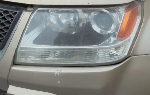 Suzuki Grand Vitara II Headlight/headlamp