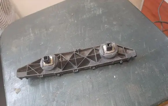 Nissan Micra Rear bumper mounting bracket 852211HA0A