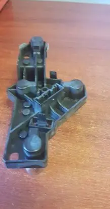 Tail light bulb cover holder