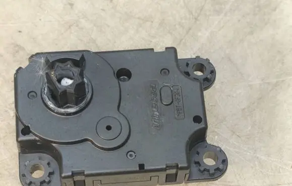 Opel Corsa F Air flap motor/actuator 16000458 TB1102 HAD36011A