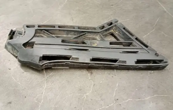 Volkswagen Touran I Front bumper mounting bracket 1T0807178