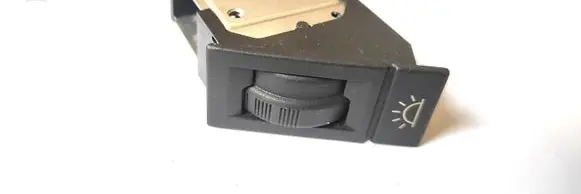 Panel lighting control switch