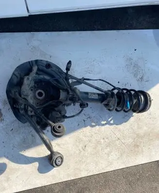 Front wheel hub spindle knuckle