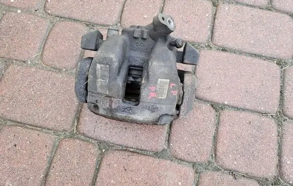 Opel Combo E Front brake caliper 9830798880