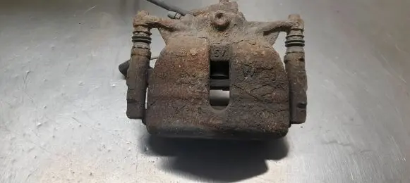 Volkswagen Golf VII Front brake caliper 6799D