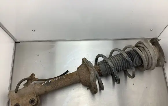 Subaru Forester SG Front shock absorber with coil spring 