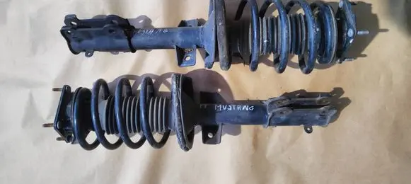Ford Mustang V Front shock absorber with coil spring