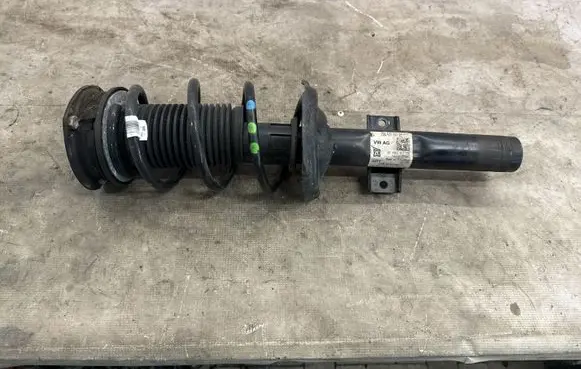 Volkswagen T-Cross Front shock absorber with coil spring 2Q0413031DM