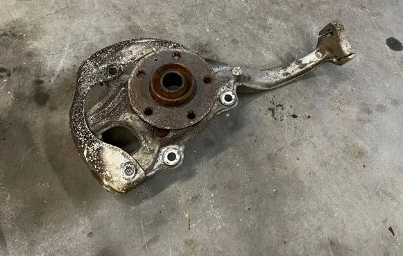 Porsche Macan (95B) Front wheel hub spindle knuckle 95B407253E