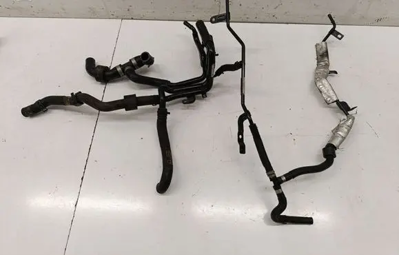 Volkswagen Golf VII Engine coolant pipe/hose 5Q0121064AG 04L121064A