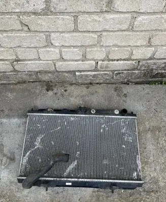 Nissan Almera N16 Coolant radiator SS9H13AL0236701