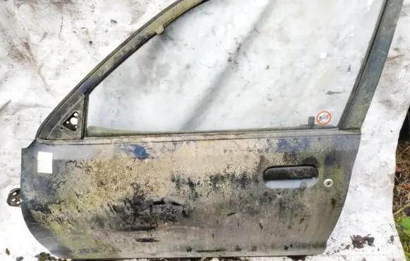 Mazda 121 SM Front door pilkos