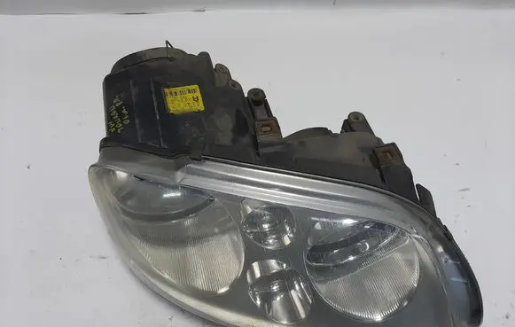 Volkswagen Touran I Headlight/headlamp 1T0941006F