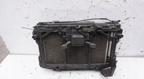 Top upper radiator support slam panel