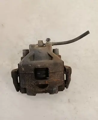 Toyota Yaris Front brake caliper 569