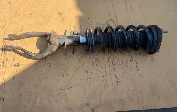 Infiniti Q70 Y51 Front shock absorber with coil spring 561101MD1B