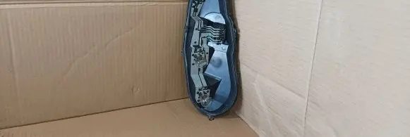 Tail light bulb cover holder