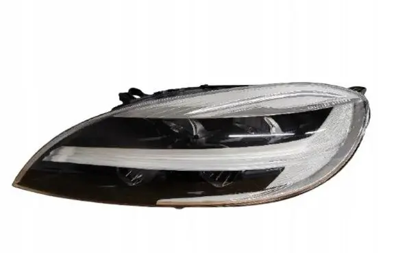 Volvo S40, V40 Headlight/headlamp 31677022