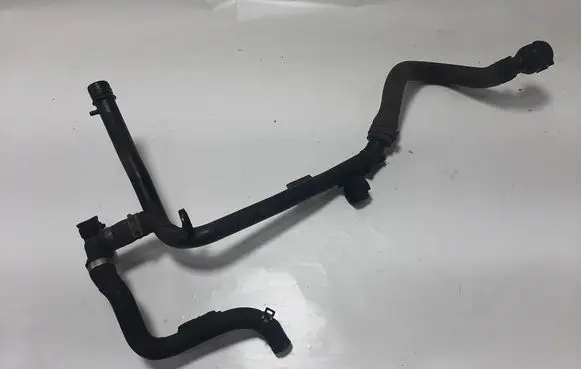 Volkswagen Golf VI Engine coolant pipe/hose 03L121065AJ