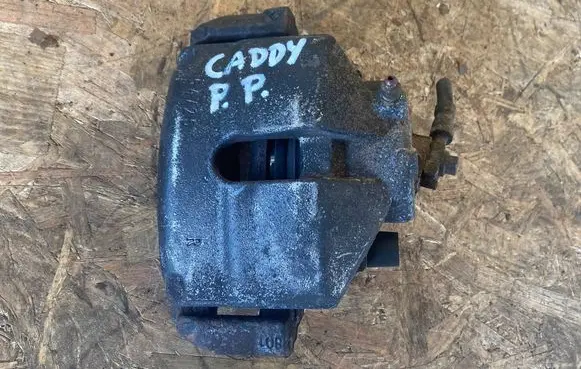 Volkswagen Caddy Front brake caliper ZACISKPPCADDY