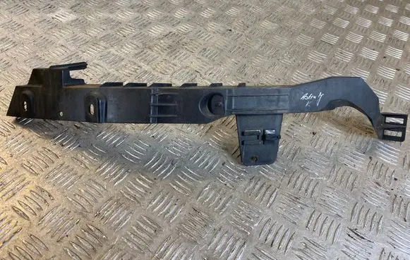 Opel Astra J Headlight/headlamp mounting bracket 13287639