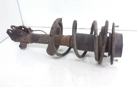 Subaru Impreza III Front shock absorber with coil spring