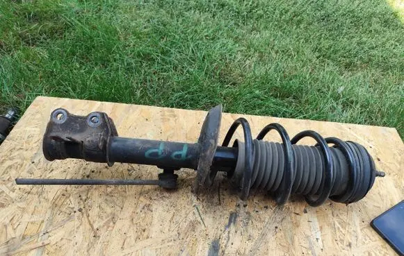 Opel Corsa D Front shock absorber/damper 13214354 GP27381