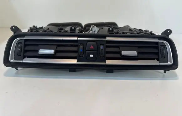 Dash center air vent grill