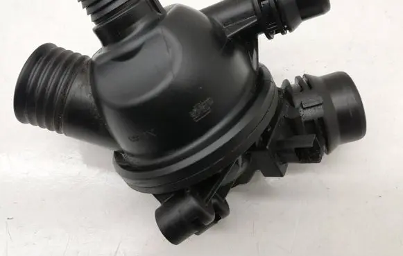 Thermostat/thermostat housing