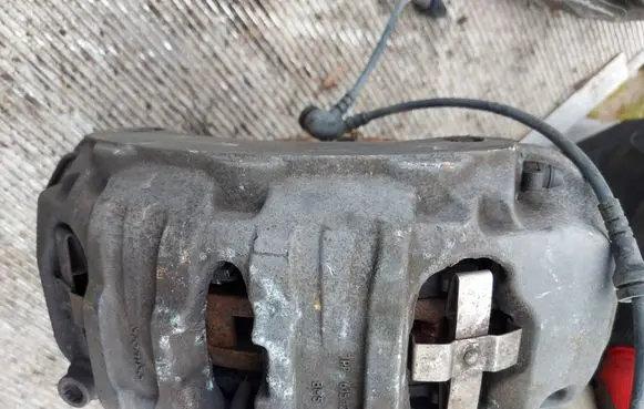 Volkswagen Touareg II Front brake caliper 7PP615123