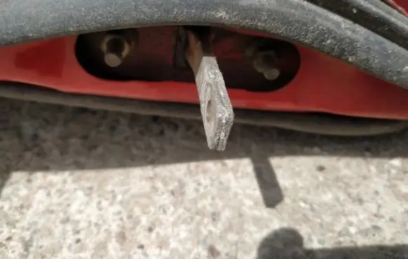 Rear door check strap stopper