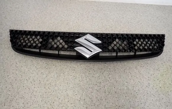 Suzuki SX4 Front fog light trim/grill 7174155L0