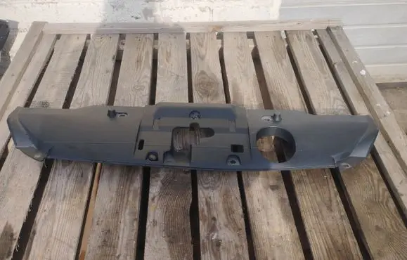 Engine bonnet/hood lock trim molding