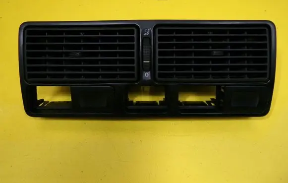 Volkswagen Golf IV Dash center air vent grill 1J0819728C