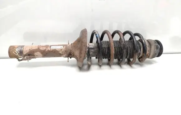 Volkswagen Golf IV Front shock absorber with coil spring 1J0413031AG