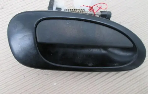 Mazda 323 F Rear door exterior handle
