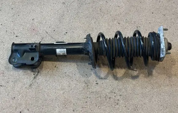 KIA EV9 Front shock absorber with coil spring 54651DO120