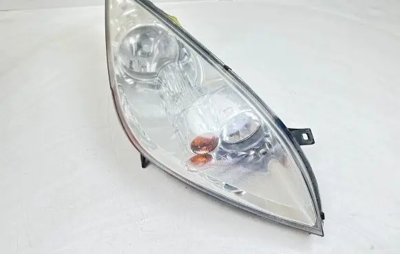 Mitsubishi Colt Headlight/headlamp MR957354 0301208202