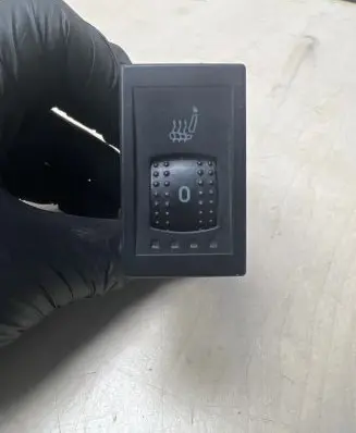 Seat heating switch