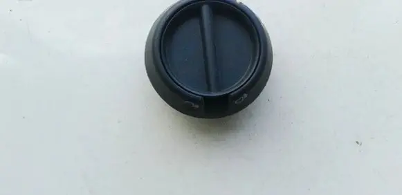 Headlight level height control switch