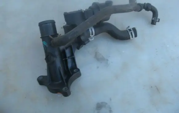 Thermostat/thermostat housing