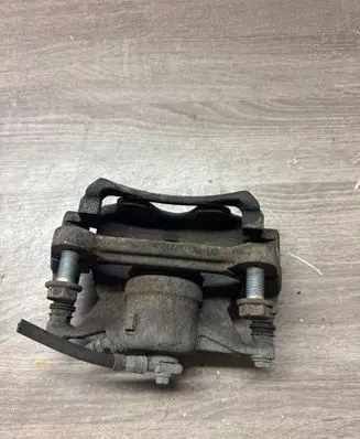 Volkswagen Golf VII Front brake caliper 6799D